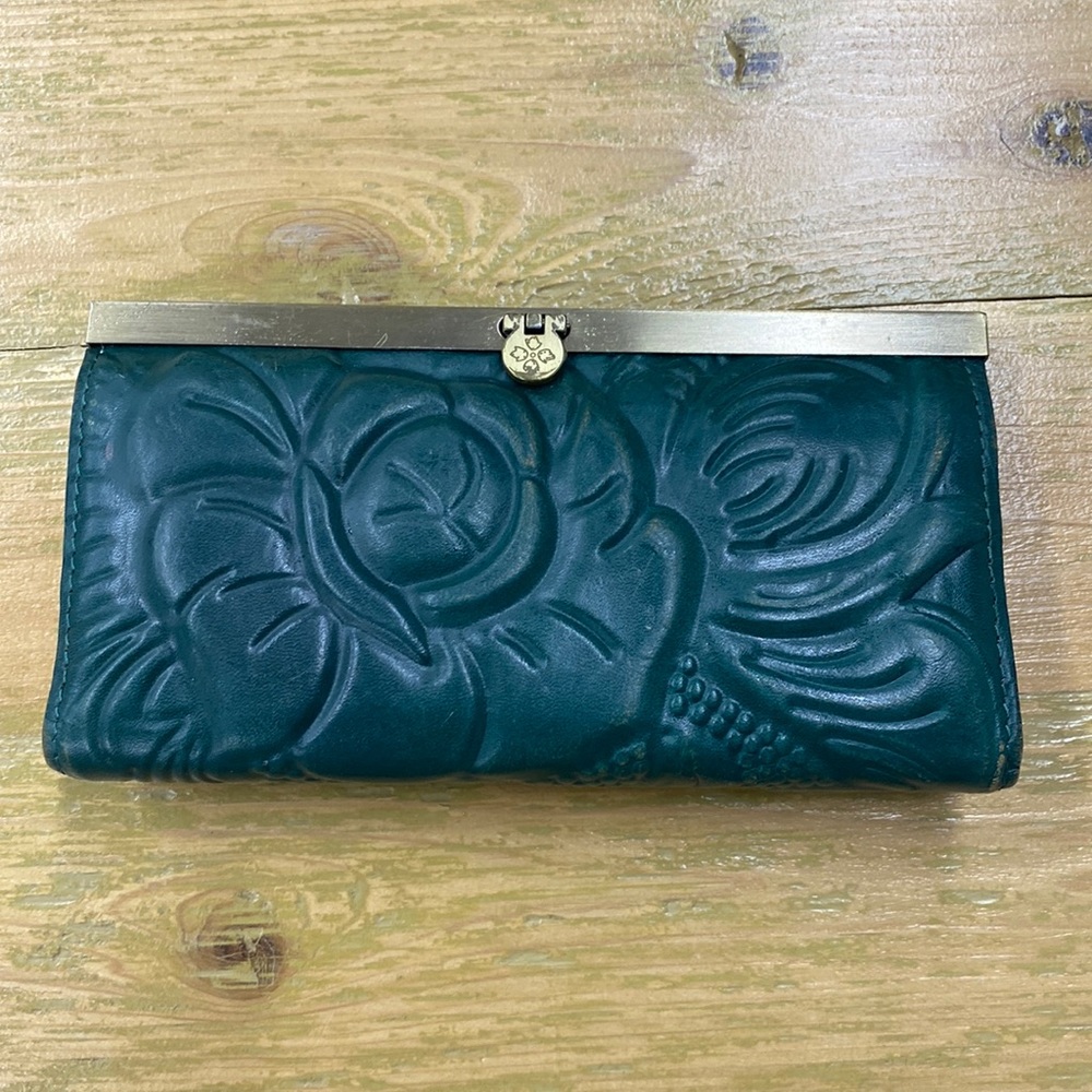 Used Patricia Nash hunter green wallet. Leather